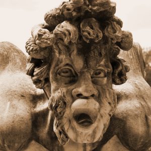 Sculpture of a man grimacing, gap year course Bomarzo
